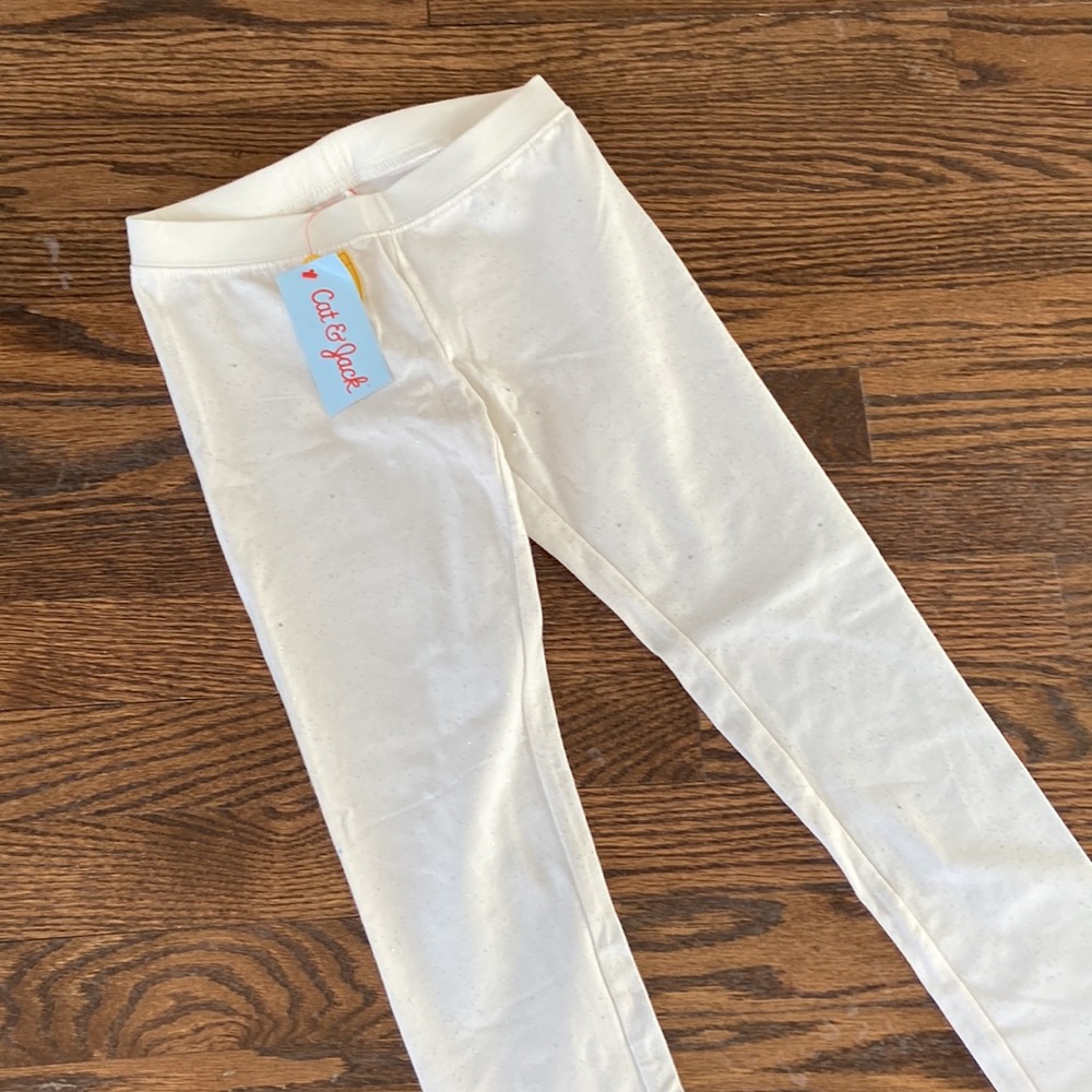Brand new leggings with sparkles - size M (7/8)